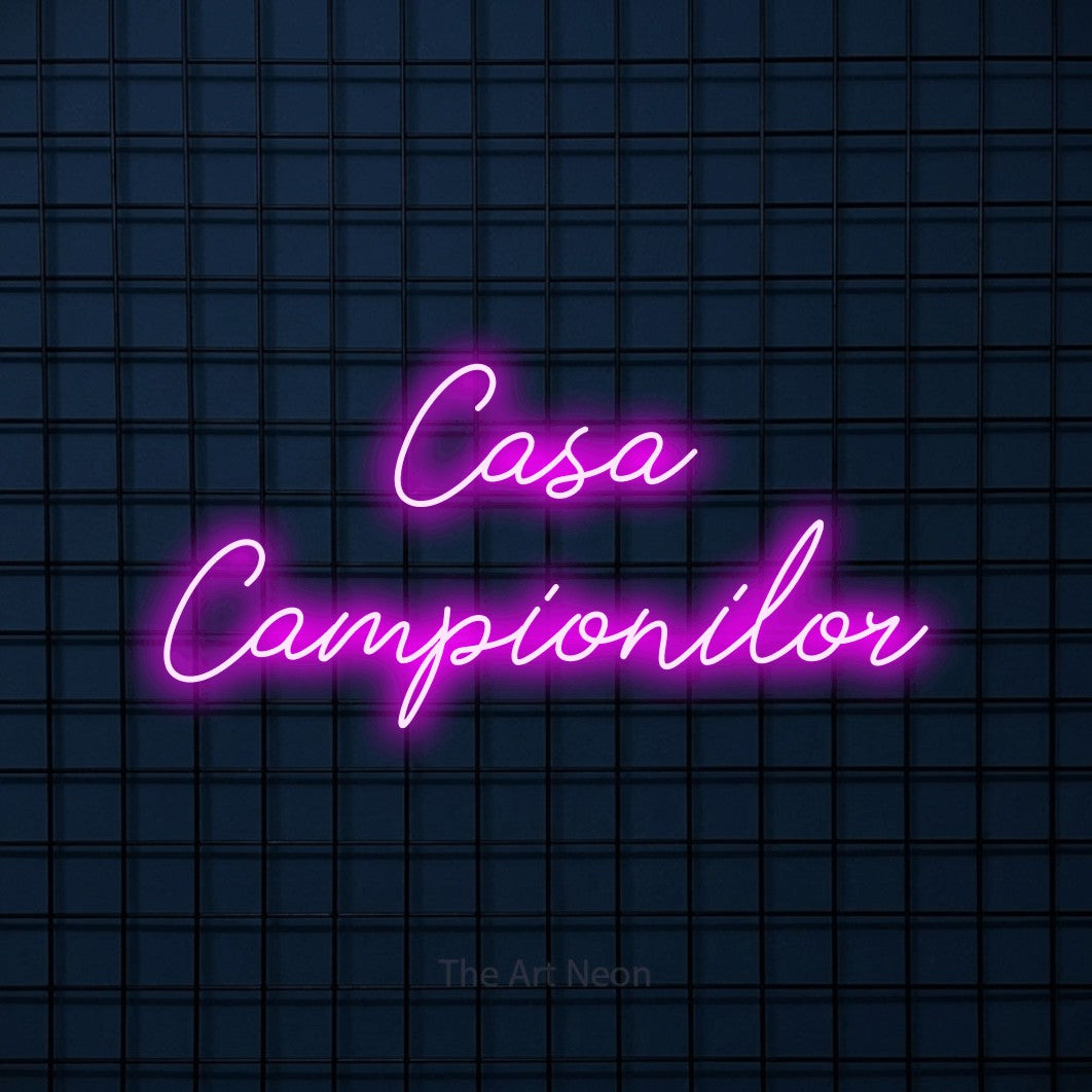 LED neon sign reading “Casa Campionilor”, arranged in two lines.
