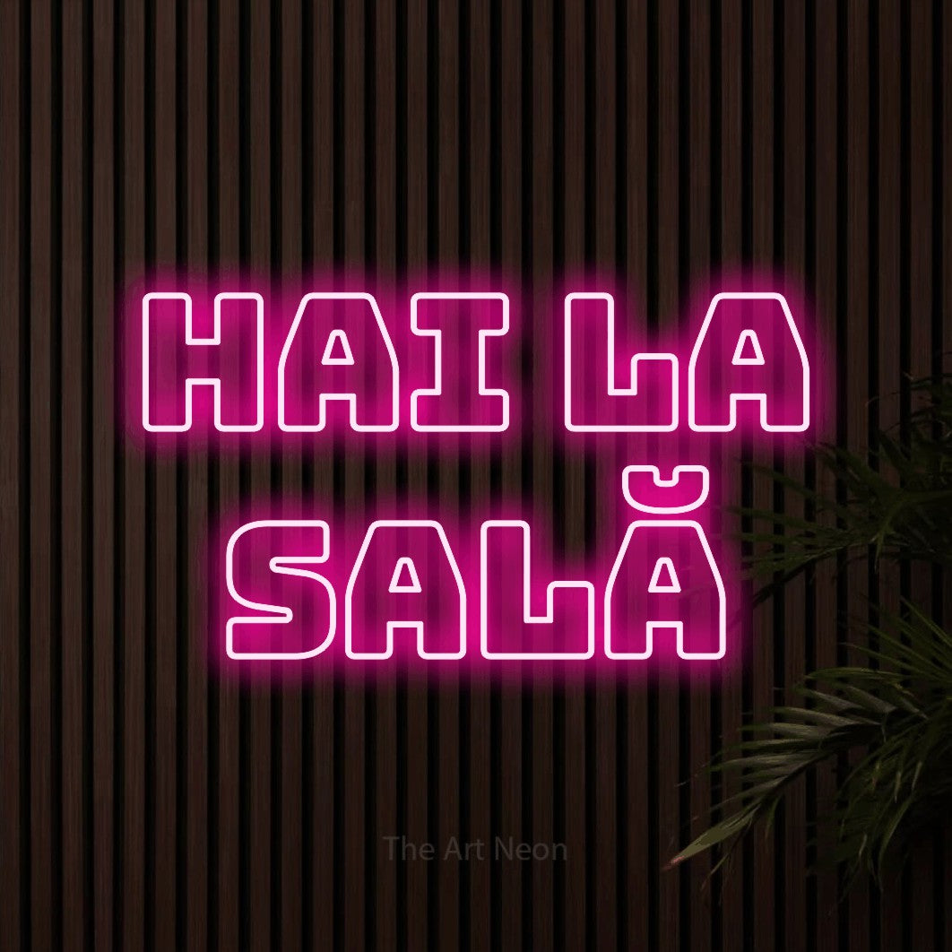 LED neon sign reading “HAI LA SALĂ”, arranged in two lines.