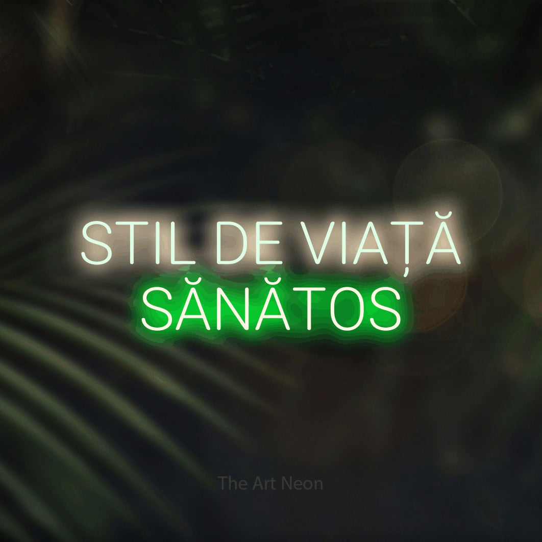 LED neon sign reading “STIL DE VIAȚĂ SĂNĂTOS”, arranged in two lines.