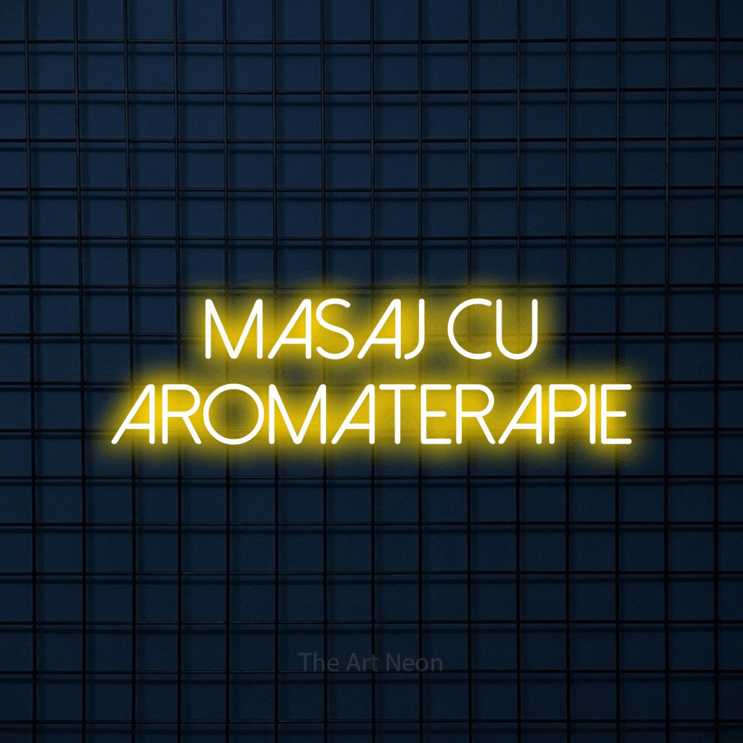 LED neon sign reading “masaj cu aromaterapie”, arranged in two lines.