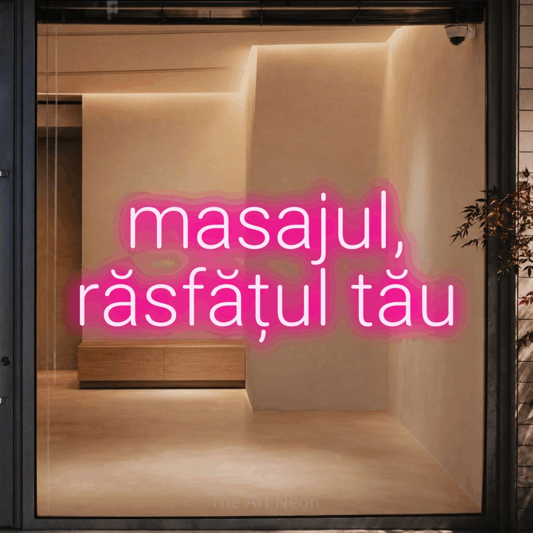 LED neon sign reading “masajul, răsfățul tău”, arranged in two lines.