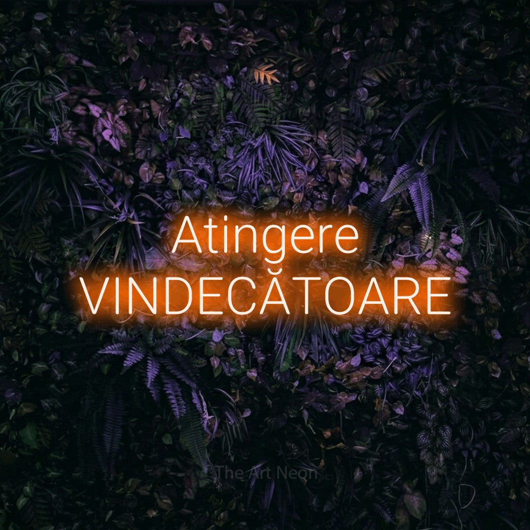 LED neon sign reading “Atingere VINDECĂTOARE”, arranged in two lines.
