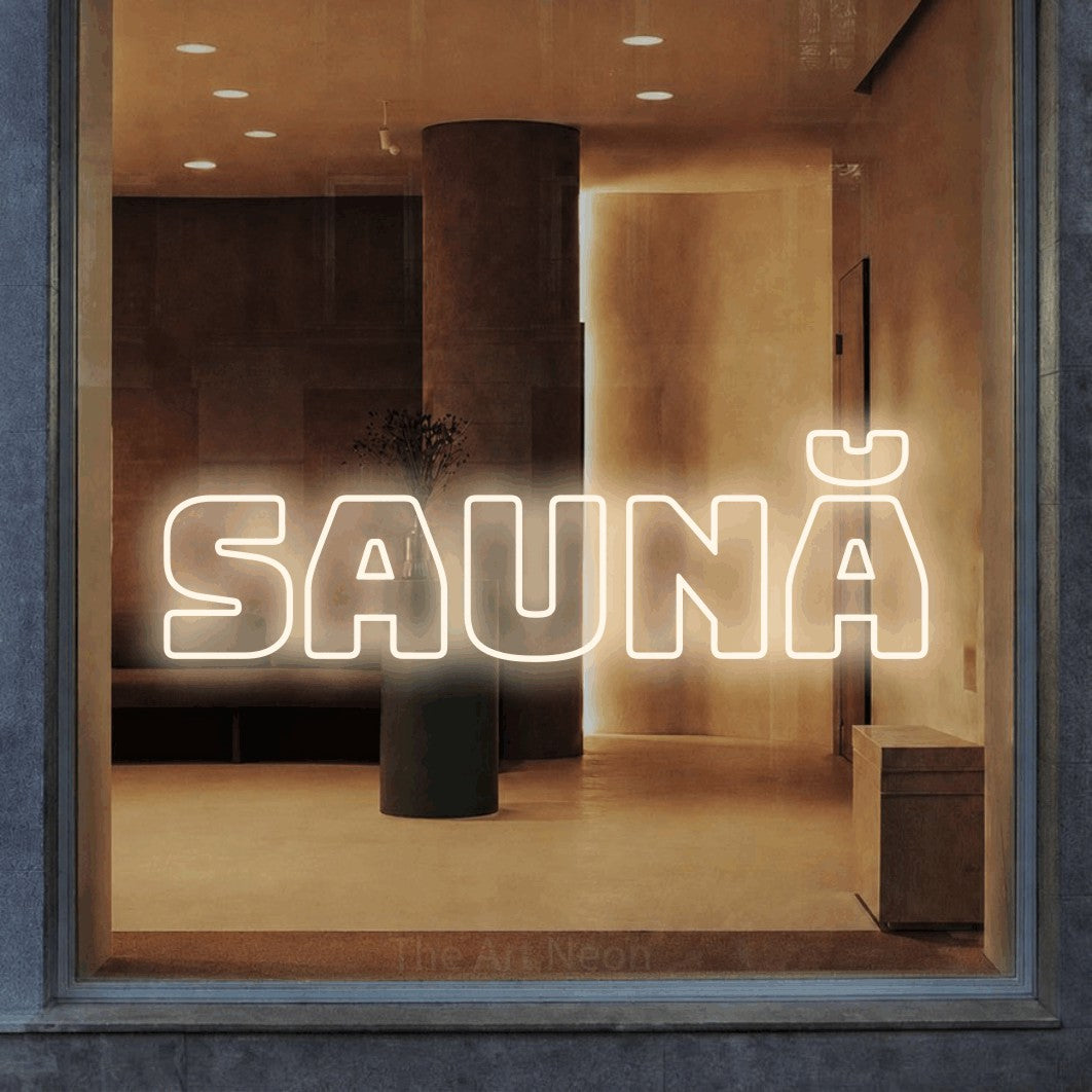 LED neon sign reading “saună”, arranged in a single line.