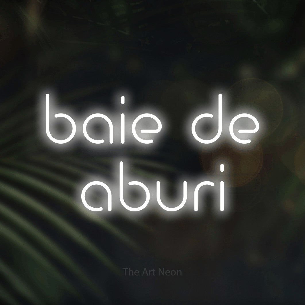 LED neon sign reading “baie de aburi”, arranged in two lines.