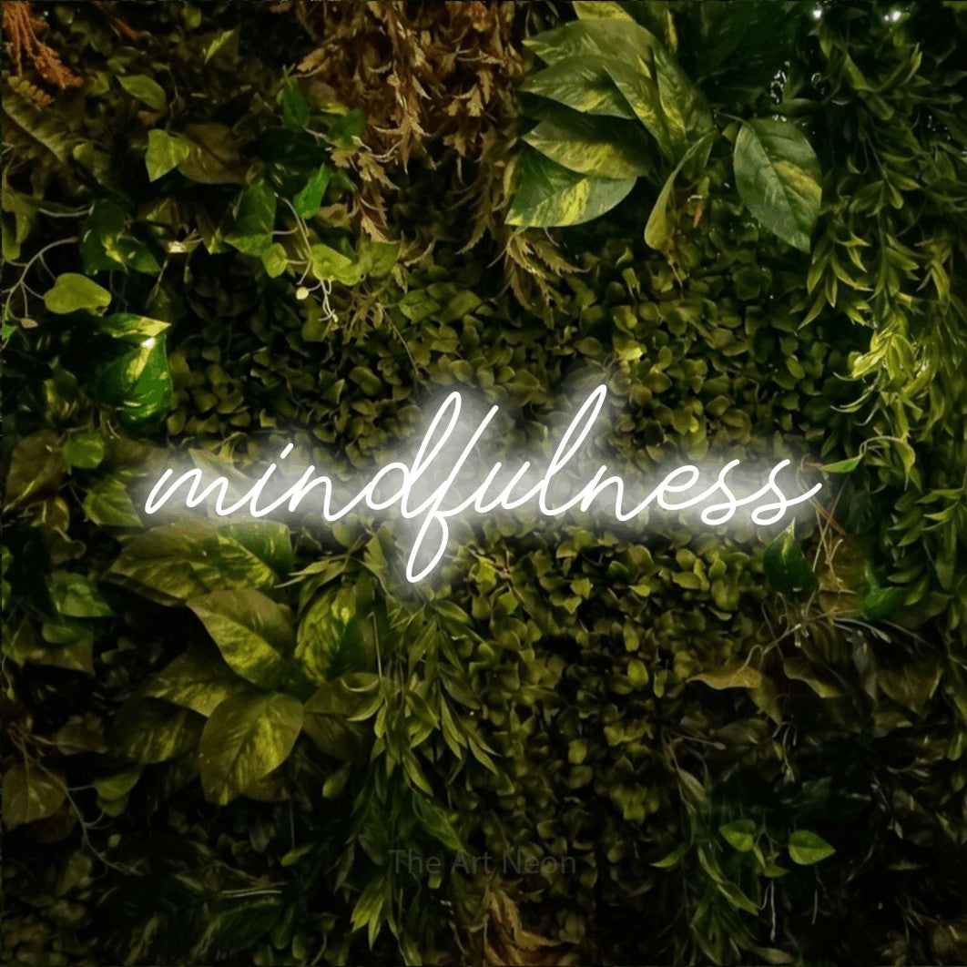 LED neon sign reading “mindfulness”, arranged in a single line.