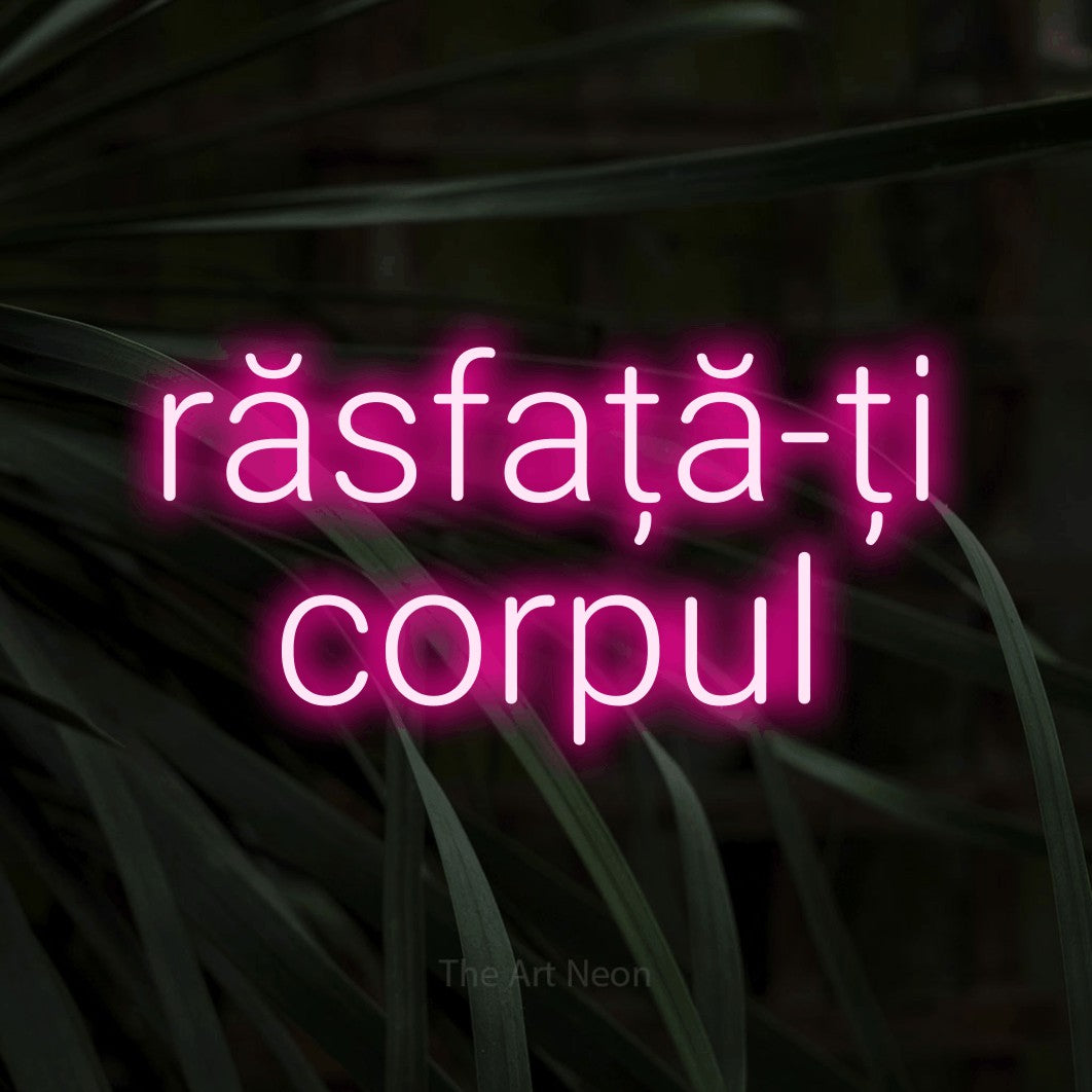 LED neon sign reading “răsfață-ți corpul”, arranged in two lines.
