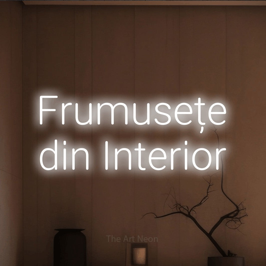 LED neon sign reading “Frumusețe din Interior”, arranged in two lines.