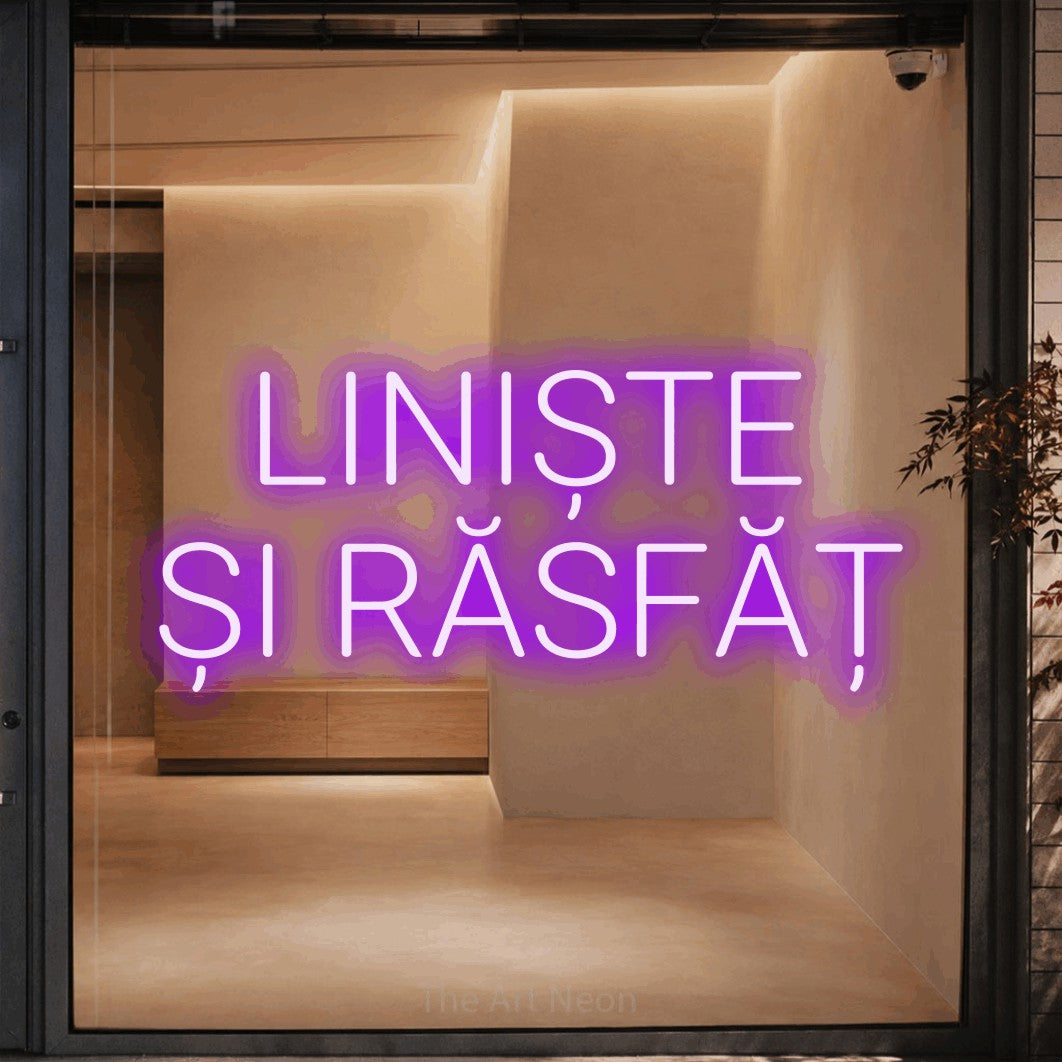 LED neon sign reading “LINIȘTE ȘI RĂSFĂȚ”, arranged in two lines.