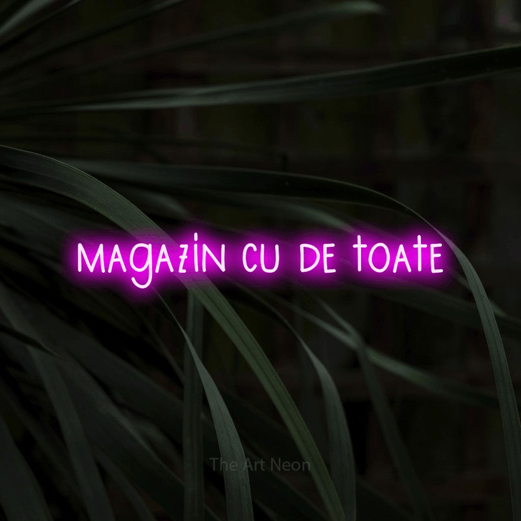 LED neon sign reading “magazin cu de toate”, arranged in a single line.