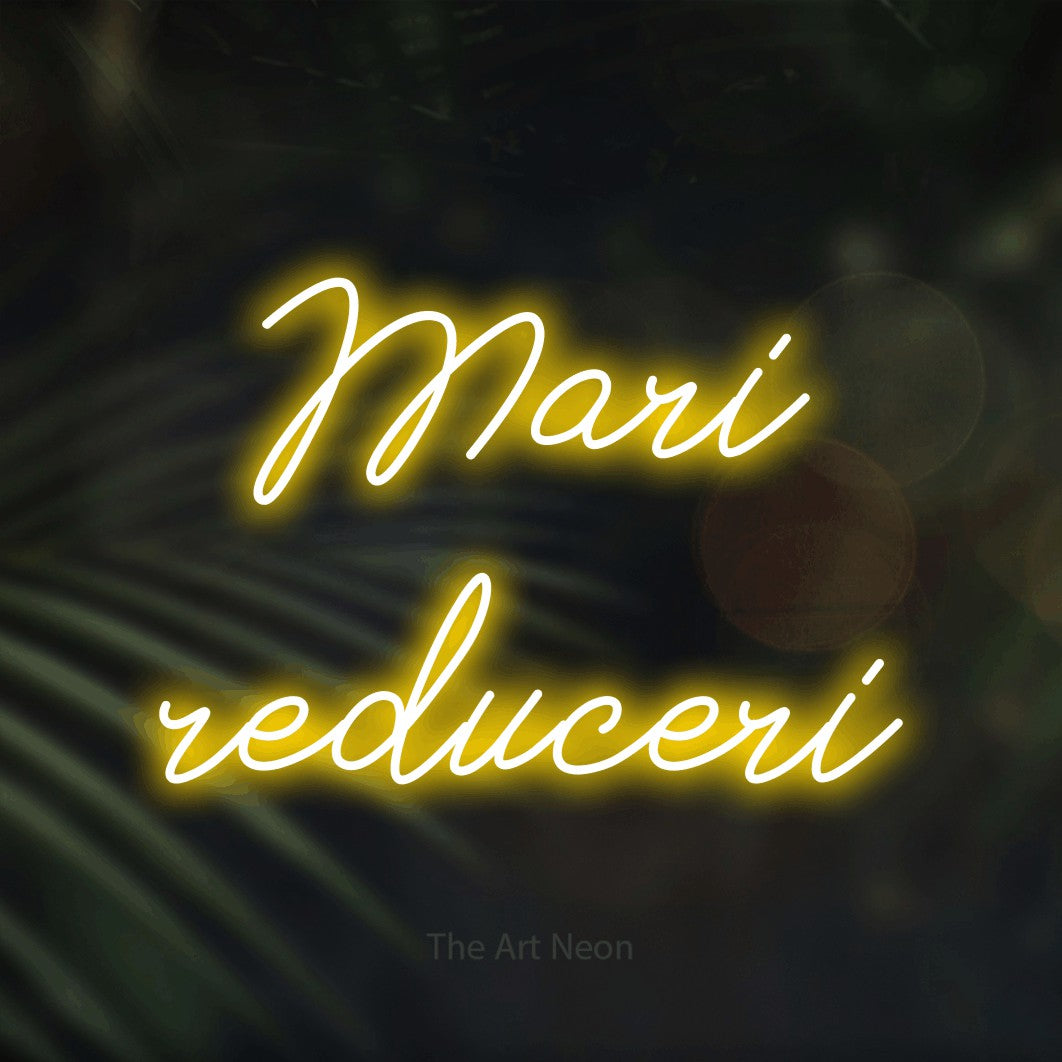 LED neon sign reading “Mari reduceri”, arranged in two lines.