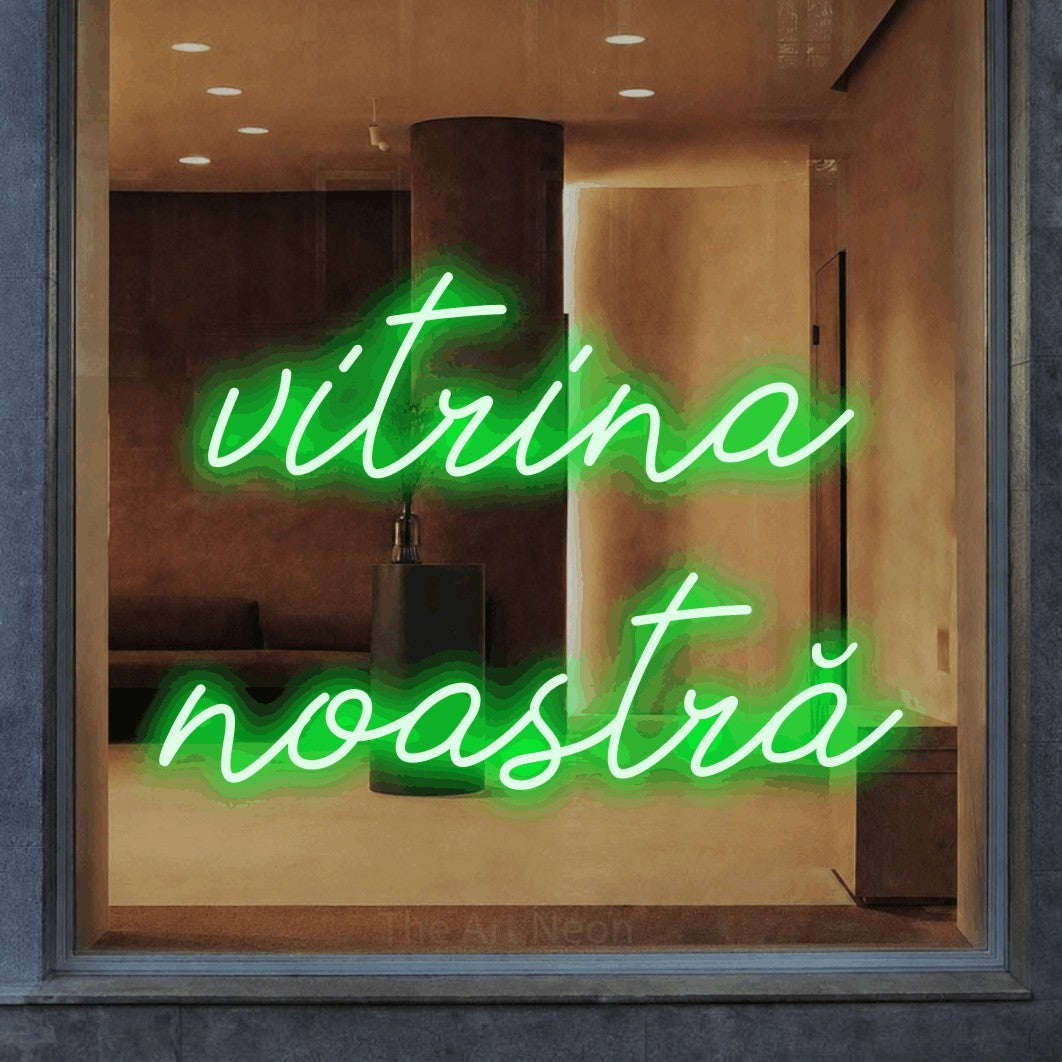 LED neon sign reading “vitrina noastră”, arranged in two lines.