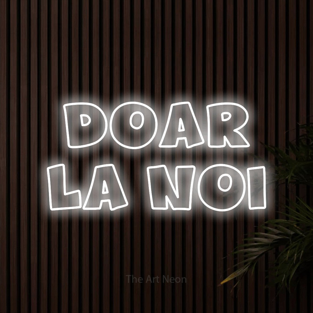 LED neon sign reading “doar la noi”, arranged in two lines.