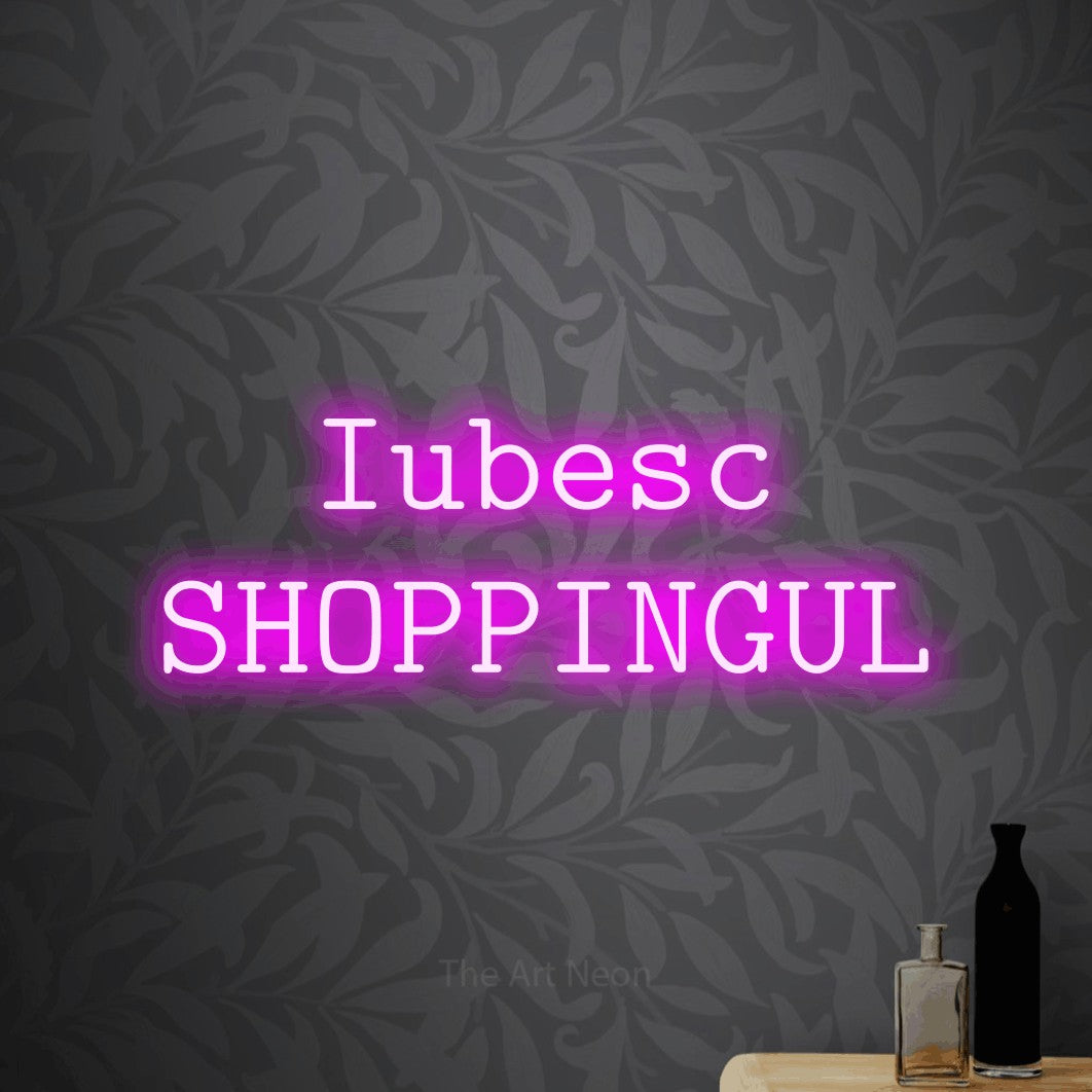LED neon sign reading “Iubesc SHOPPINGUL”, arranged in two lines.