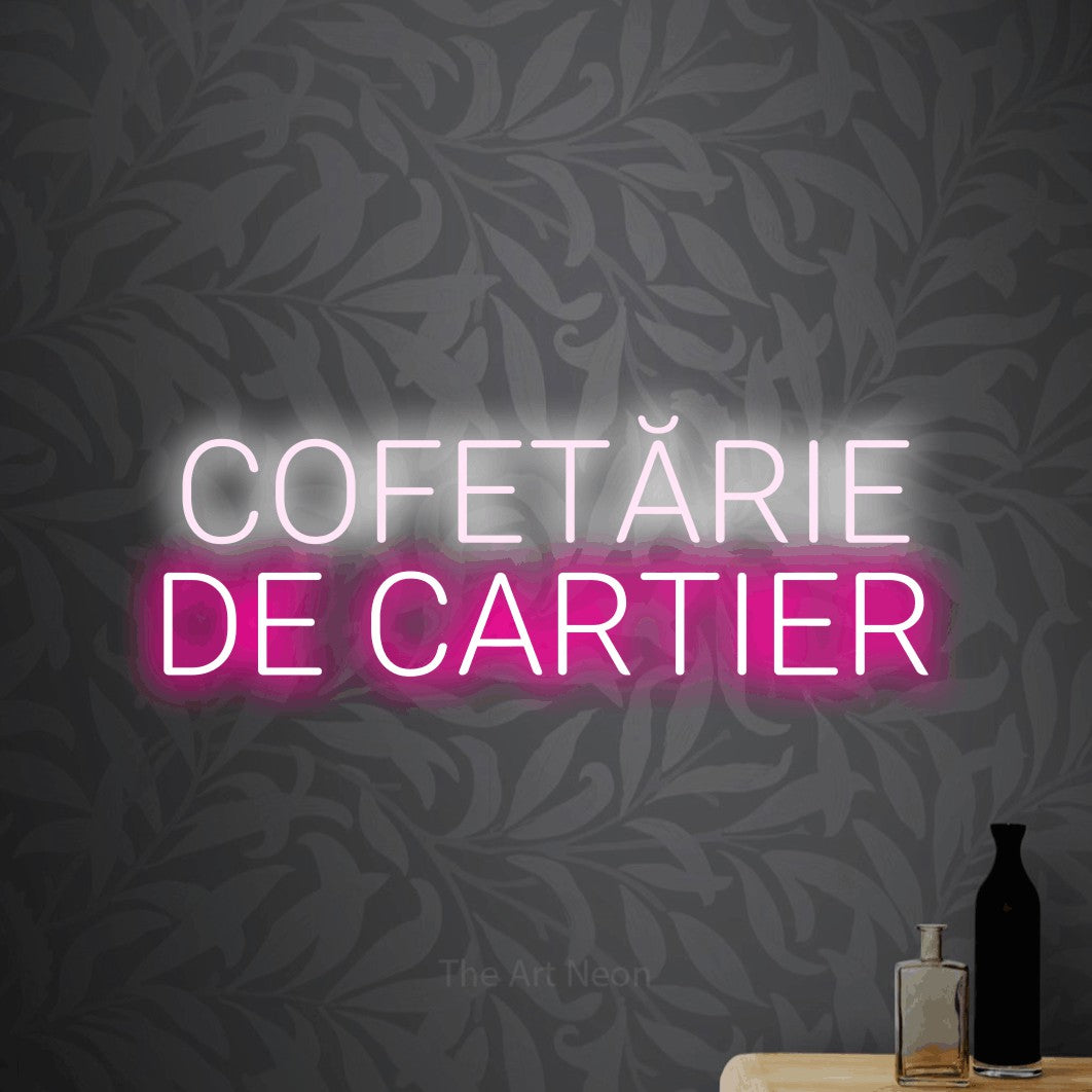 LED neon sign reading “COFETĂRIE DE CARTIER”, arranged in two lines.