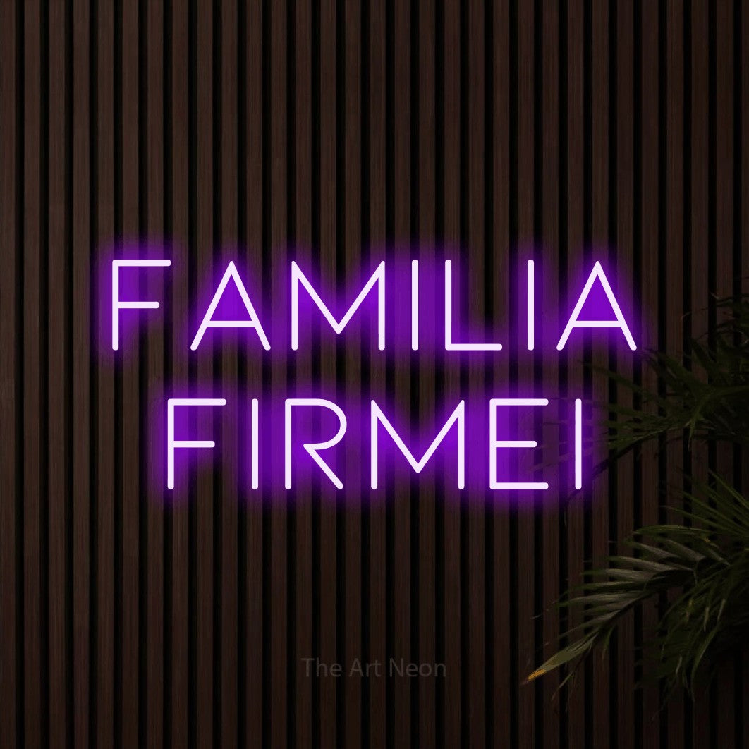 LED neon sign reading “familia firmei”, arranged in two lines.