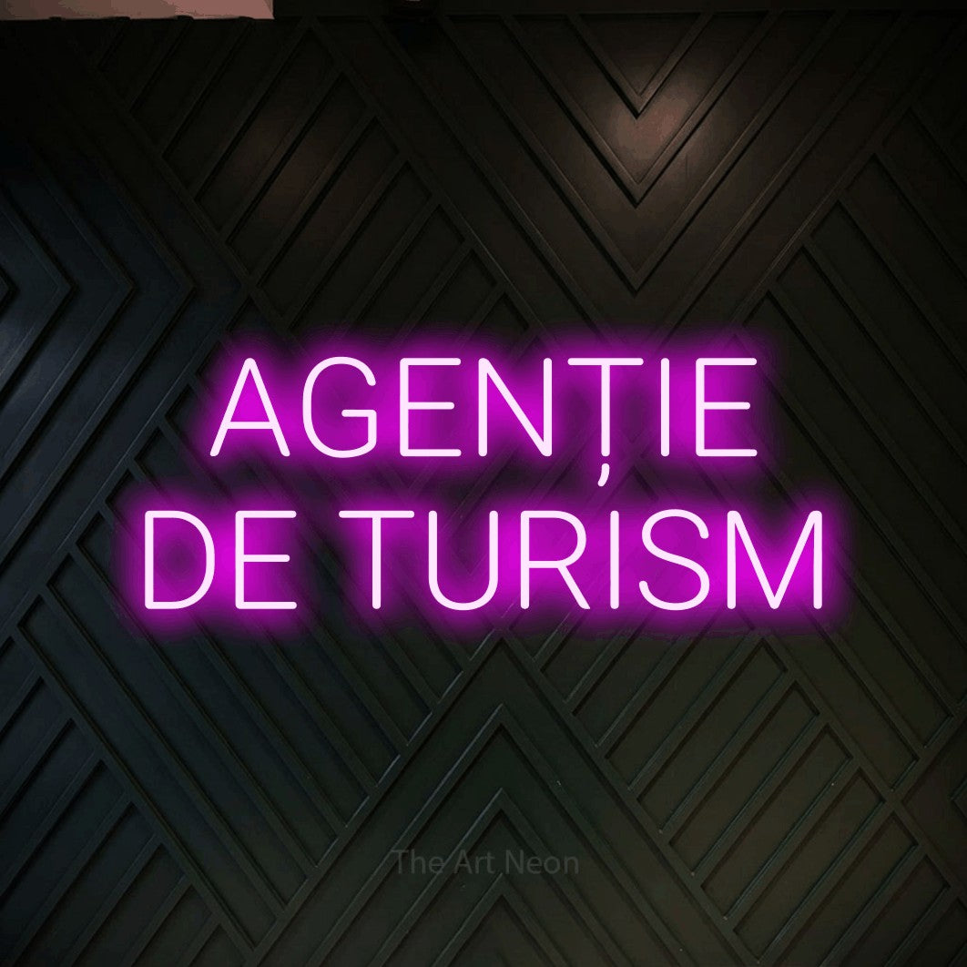 LED neon sign reading “AGENȚIE DE TURISM”, arranged in two lines.