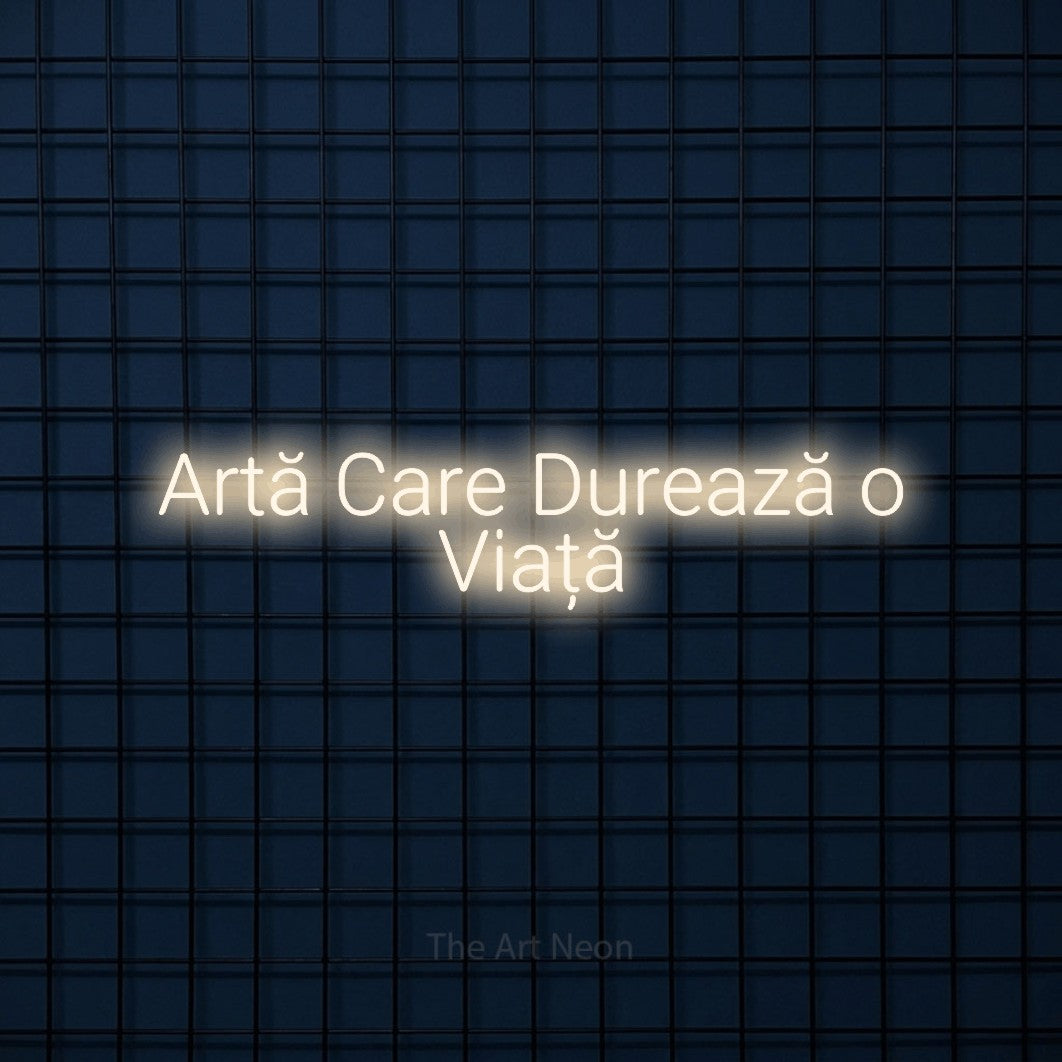 LED neon sign reading “Artă Care Durează o Viață”, arranged in two lines.