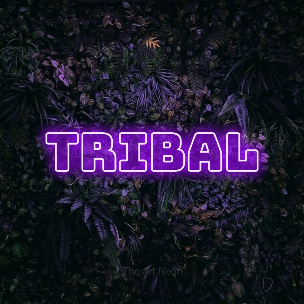LED neon sign reading “tribal”, arranged in a single line.