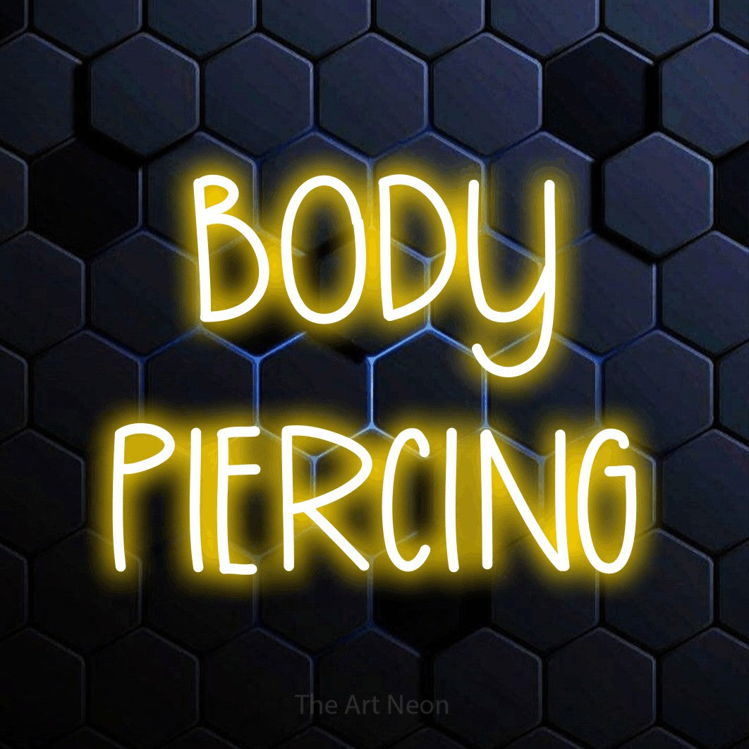 LED neon sign reading “BODY PIERCING”, arranged in two lines.
