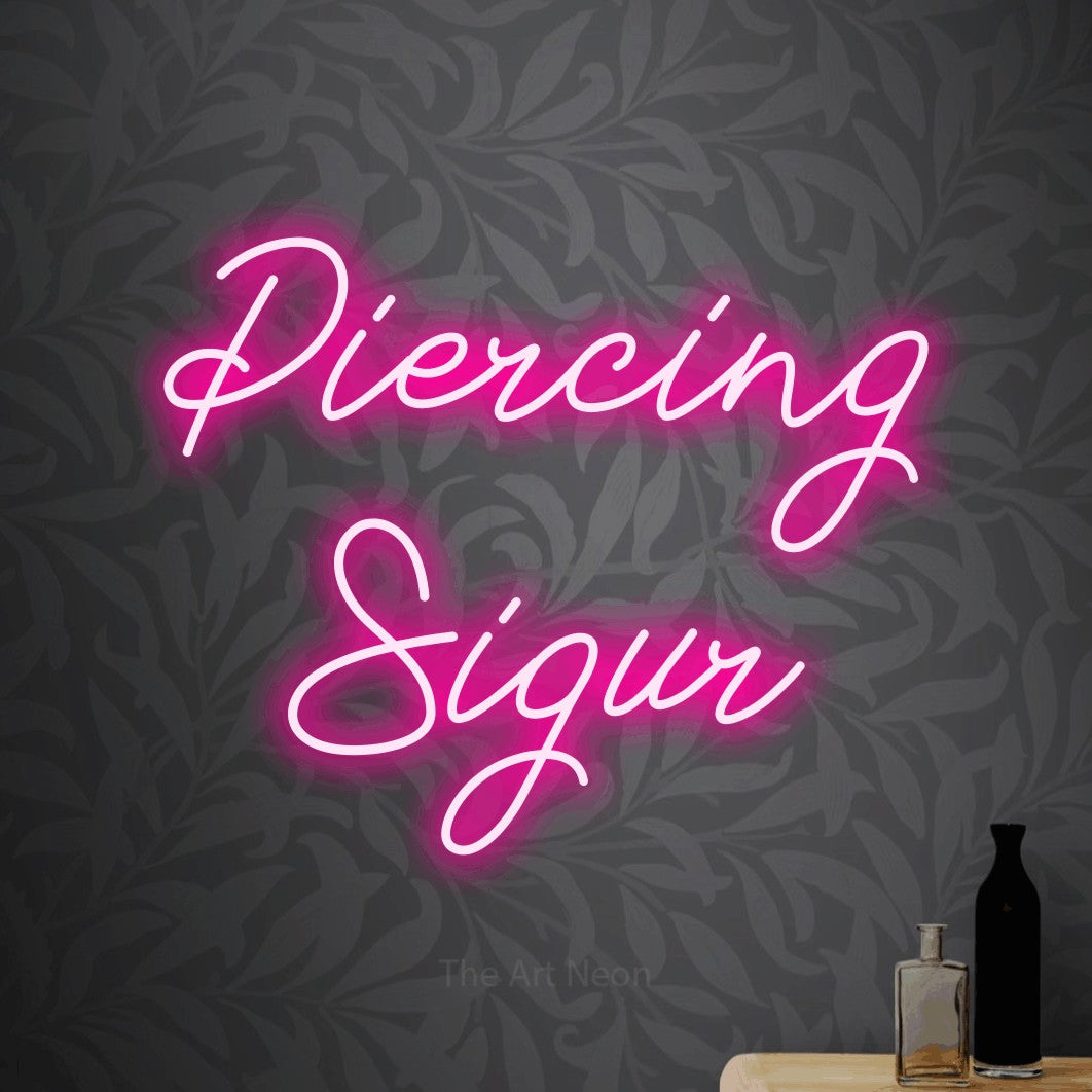 LED neon sign reading “Piercing Sigur”, arranged in two lines.