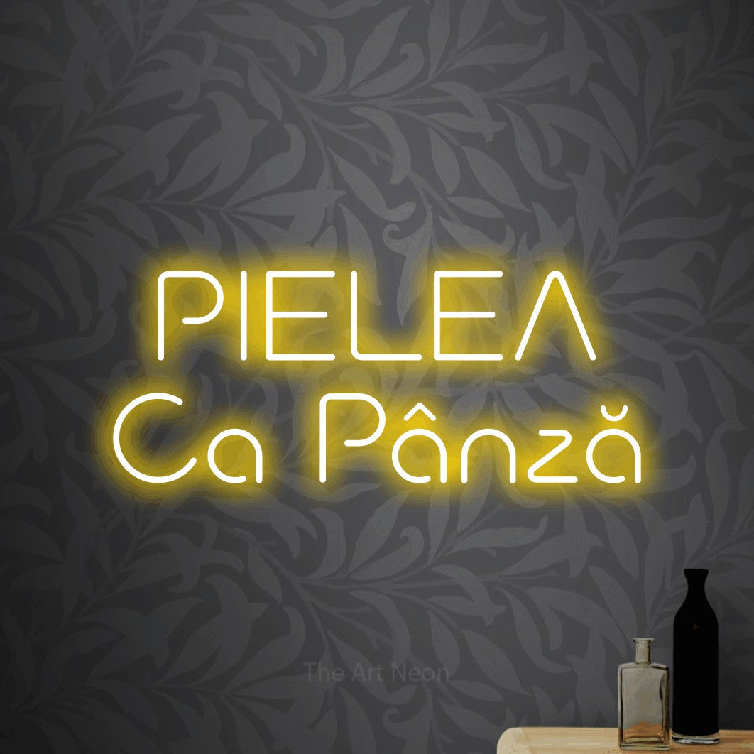 LED neon sign reading “PIELEA Ca Pânză”, arranged in two lines.