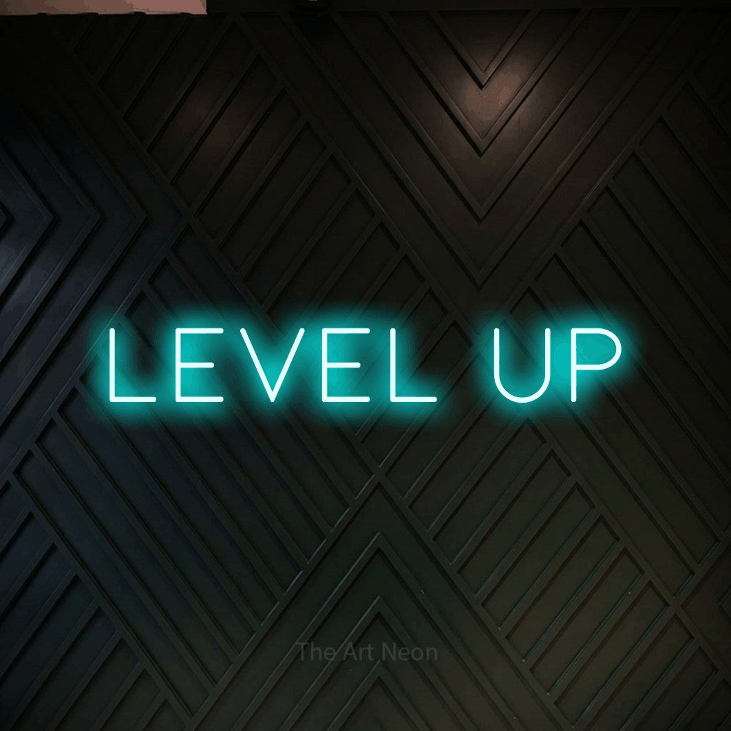 LED neon sign reading “Level up”, arranged in a single line.