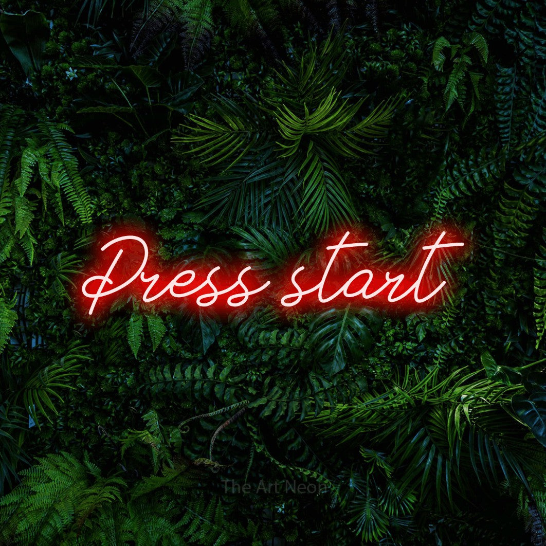 LED neon sign reading “Press start”, arranged in a single line.