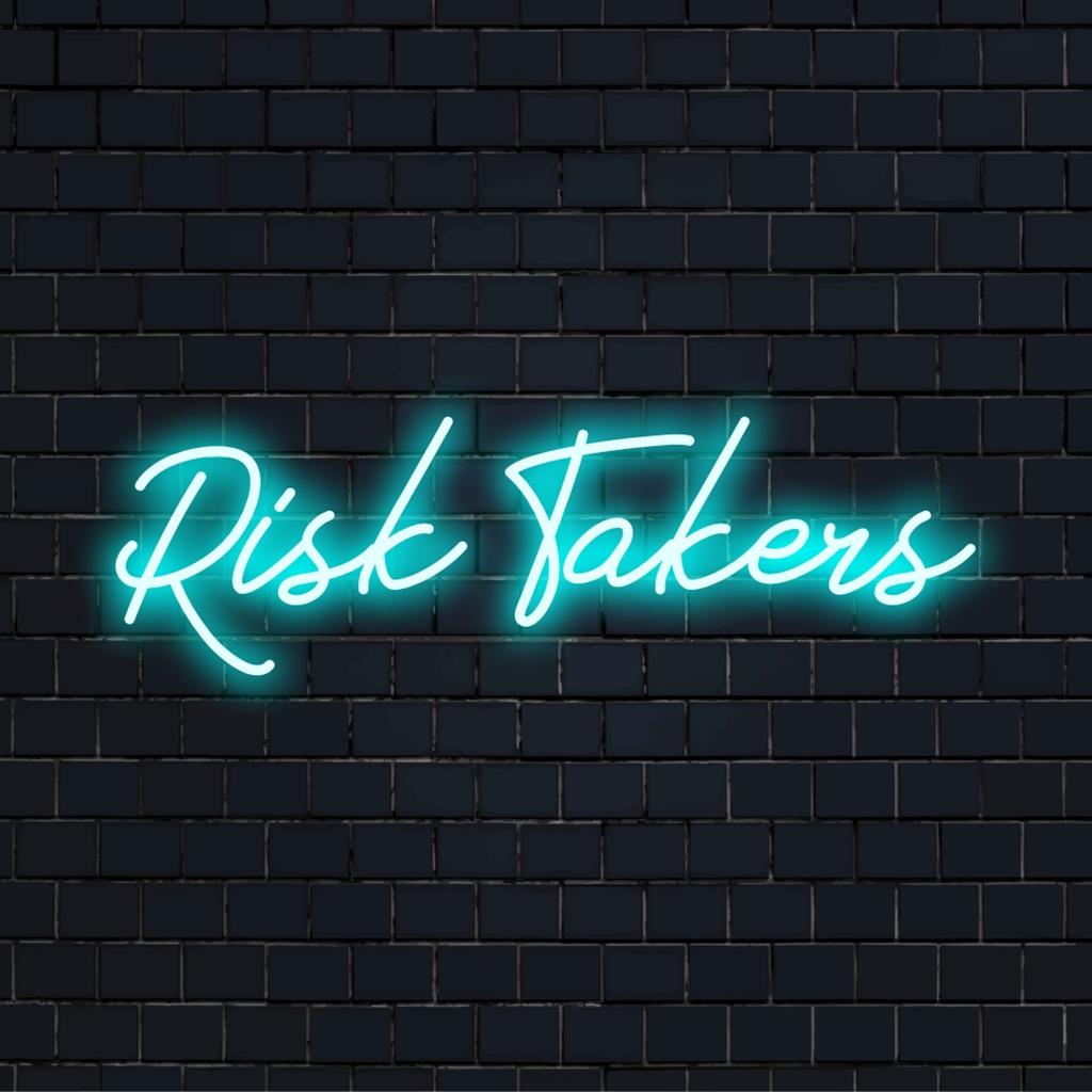 LED neon sign with bold Risk Takers quote; perfect vibrant custom piece for adding personality to any space.