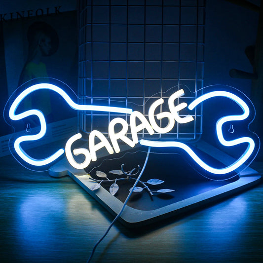 The image features a vibrant LED neon sign designed to read "Garage" in bold, tubular letters.