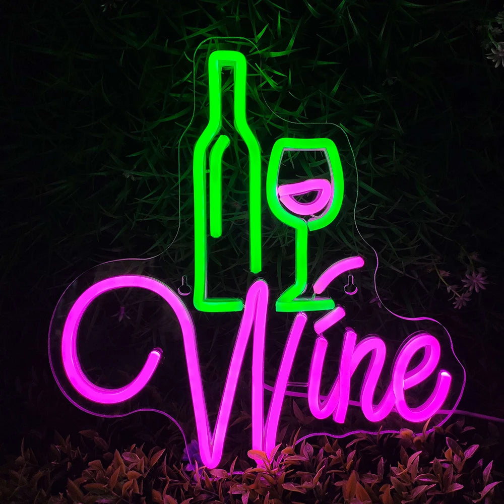 The image features a vibrant red neon sign in the shape of a wine glass.