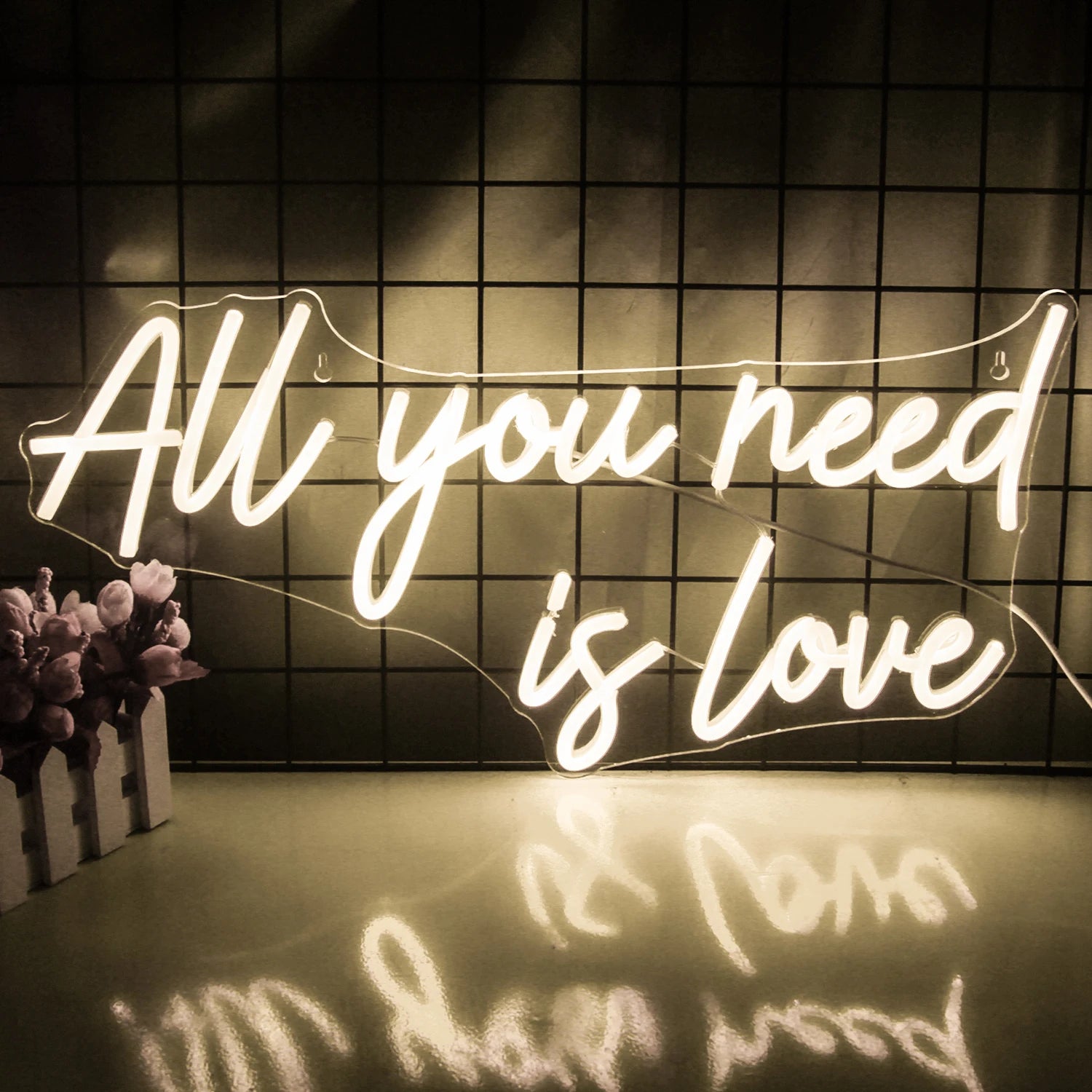 All you need is love 5V USB neon sign displayed in a compact indoor setting