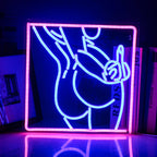 Na zdjęciu widoczny jest ręcznie wykonany neon LED przedstawiający sylwetkę kobiety w stylowej i zmysłowej pozie.