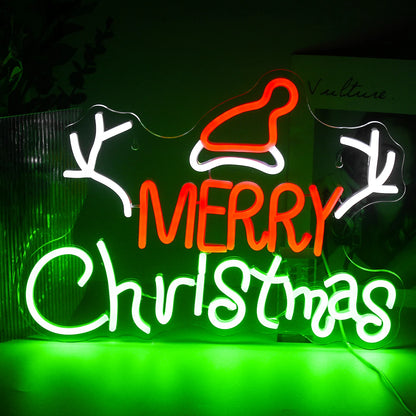 A vibrant LED neon sign displaying the word "Christmas" in stylish, cursive lettering.