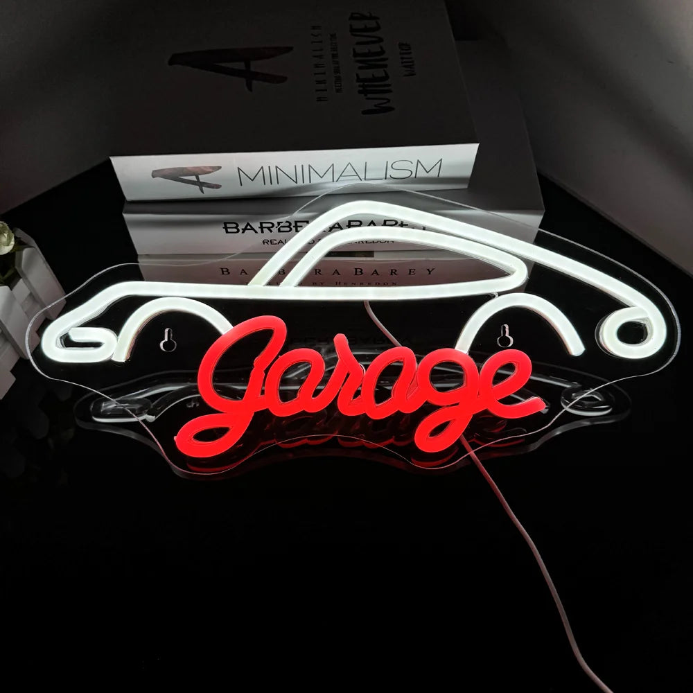 L'image présente un panneau néon LED vibrant affichant le mot « Garage » dans une police audacieuse et élégante.
