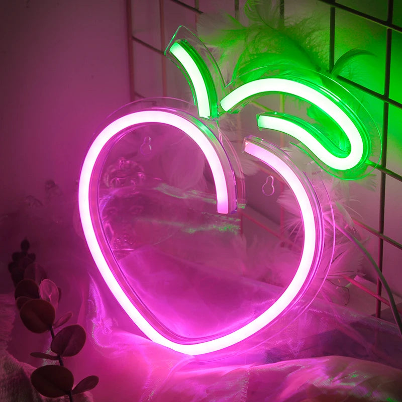 Een stijlvol ontworpen Peach LED-neonbord verlicht met een zacht, warm licht.