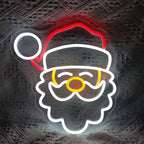 La imagen muestra un letrero de neón LED brillante y festivo que dice "Feliz Navidad".
