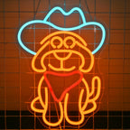 Élénk LED-es neonreklám, amely stilizált cowboy kutyát ábrázol.