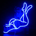 A vibrant LED neon sign depicting a stylized image of a pair of sexy women's legs.