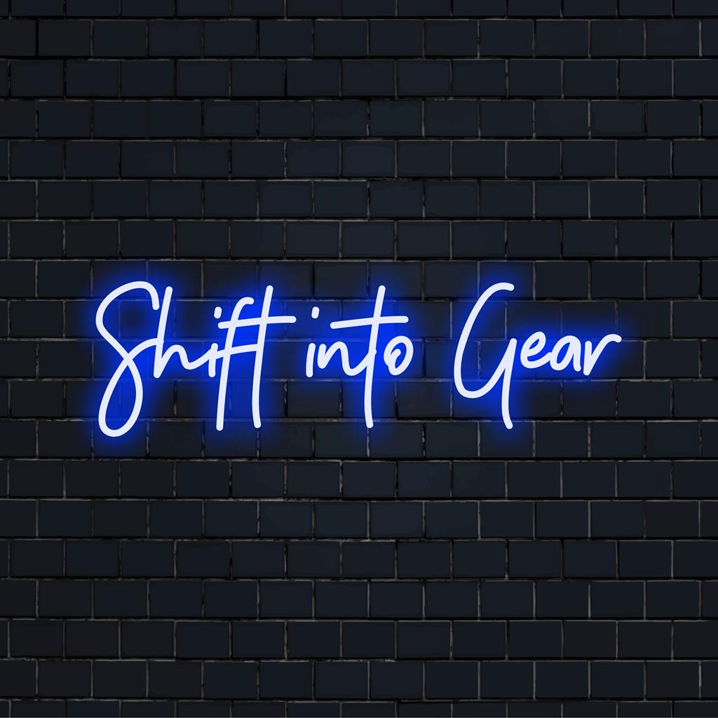 Vivace insegna al neon a LED personalizzata con la scritta Shift Into Gear, ideale per un arredamento luminoso al neon unico.