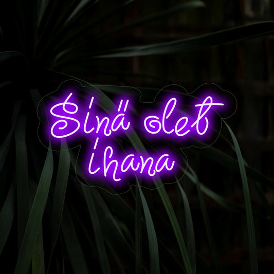"Sinä Olet Ihana Neon Sign" adds a touch of beauty with its affirming message, casting a warm and positive glow for an uplifting and encouraging ambiance in your space.