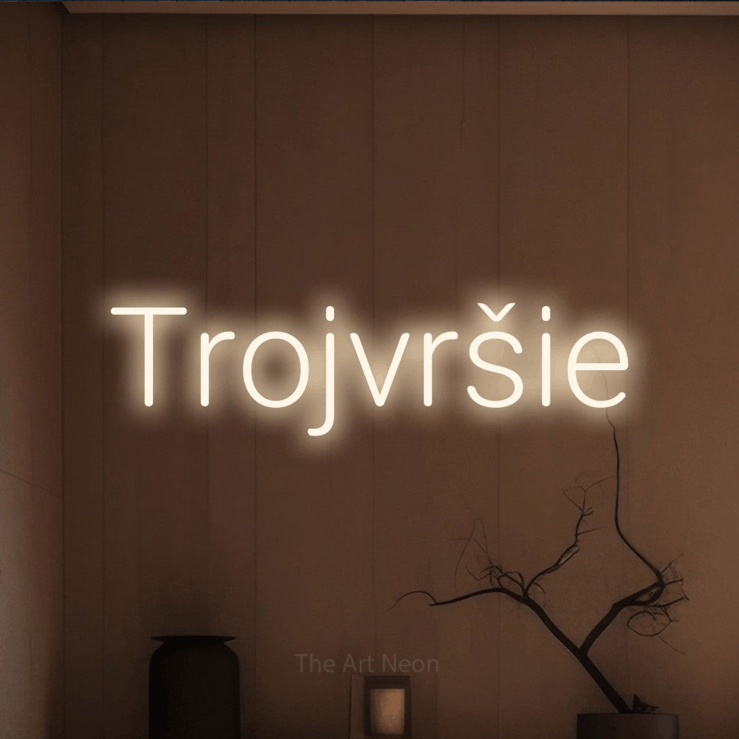 LED neon sign reading “Trojvršie”, arranged in a single line.