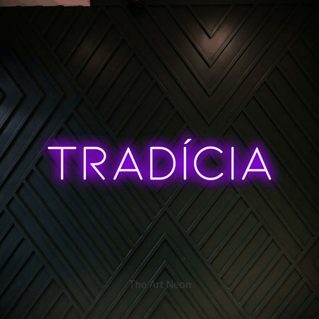 LED neon sign reading “Tradícia”, arranged in a single line.