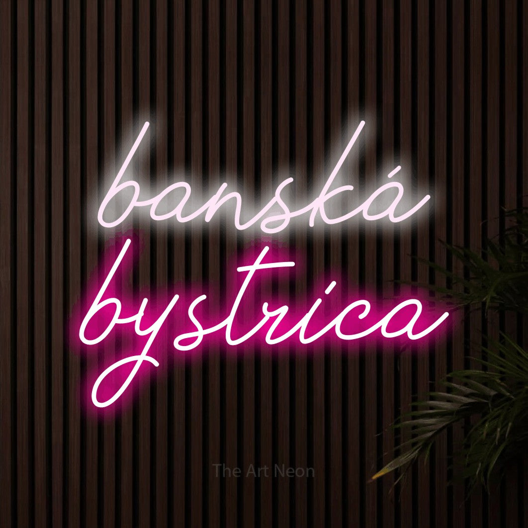 LED neon sign reading “banská bystrica”, arranged in two lines.