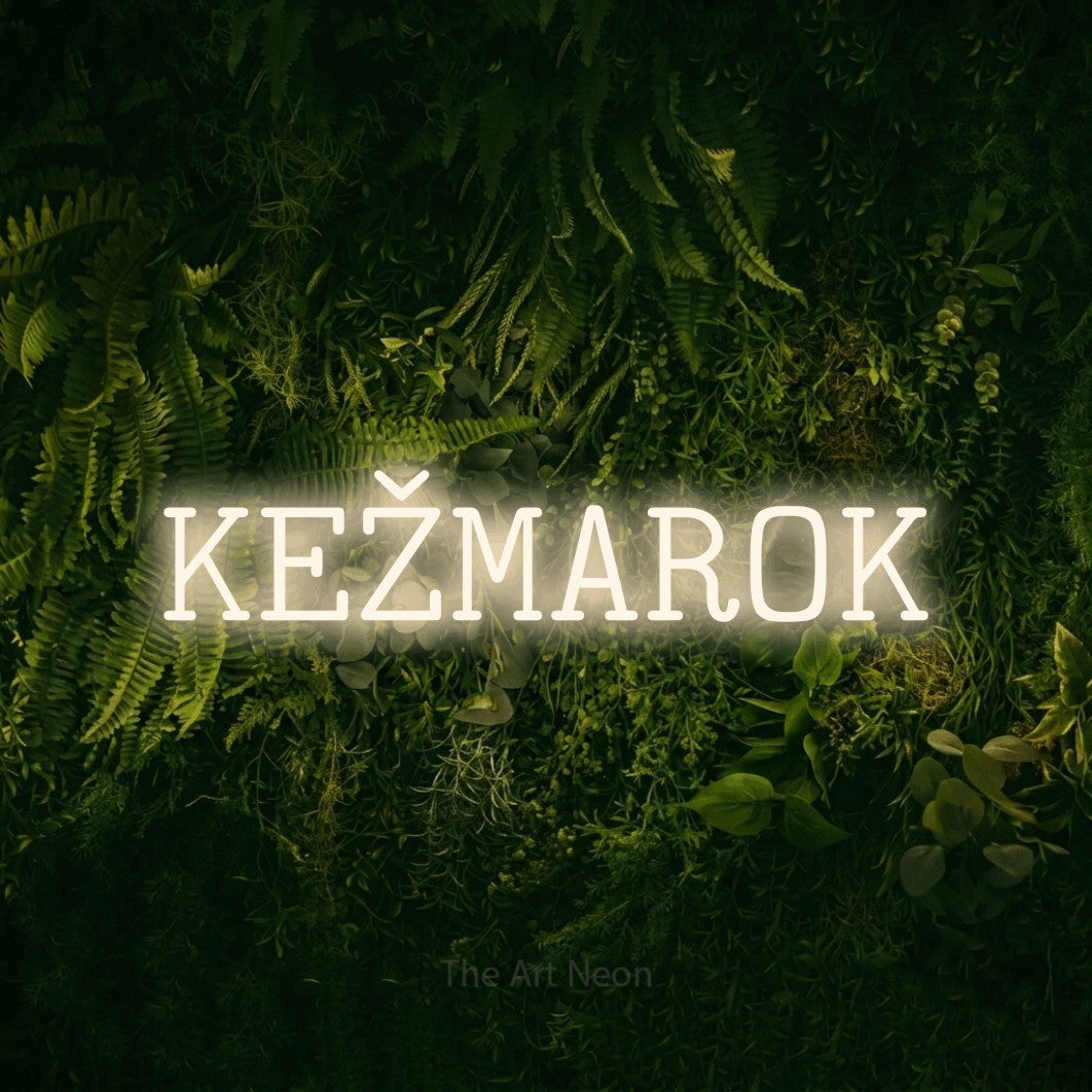 LED neon sign reading “KEŽMAROK”, arranged in a single line.