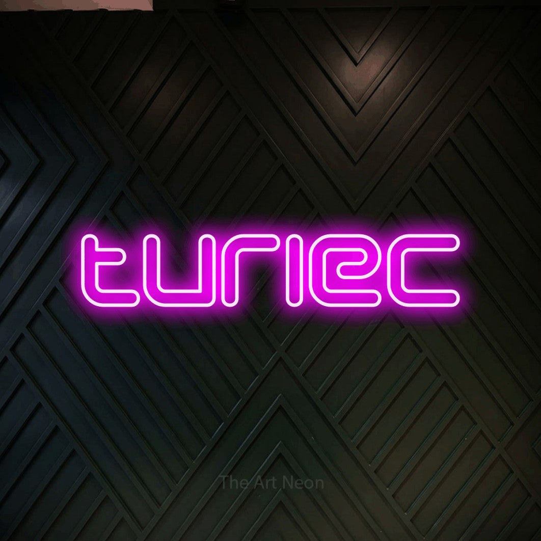 LED neon sign reading “turiec”, arranged in a single line.