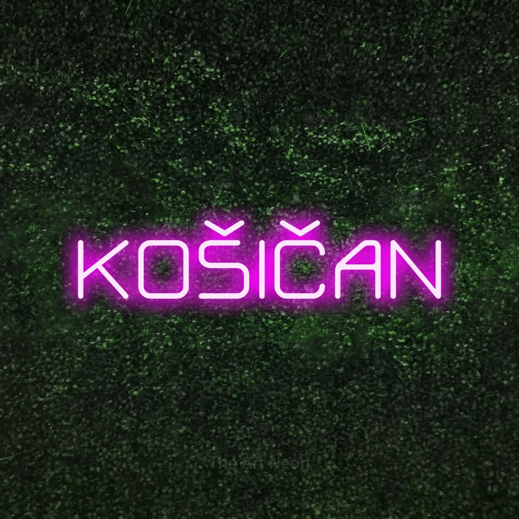 LED neon sign reading “KOŠIČAN”, arranged in a single line.