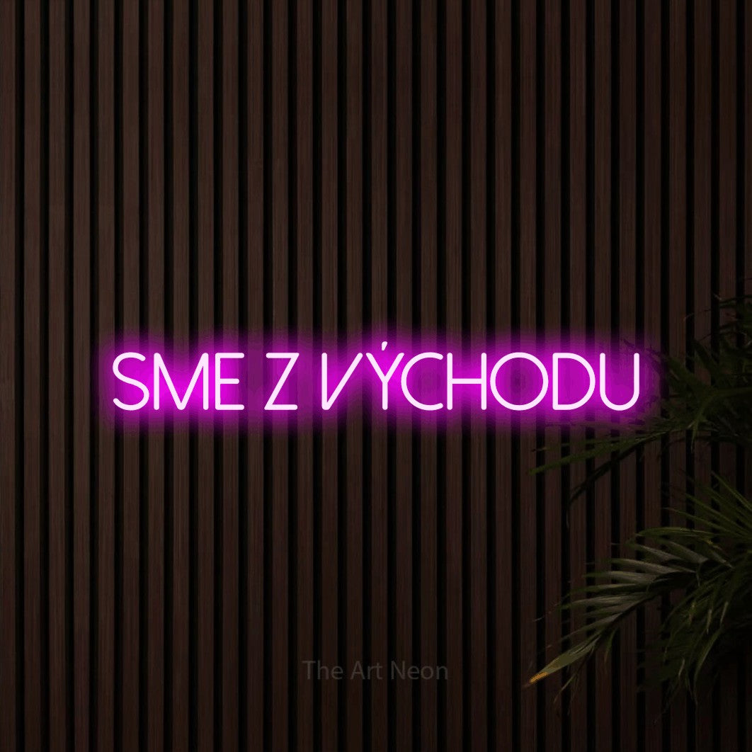 LED neon sign reading “sme z východu”, arranged in a single line.