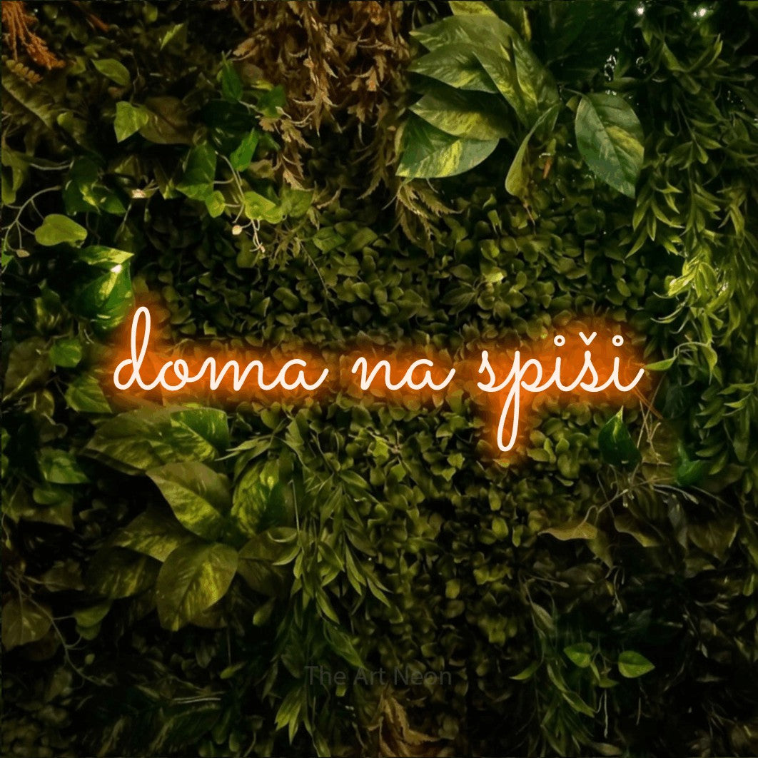 LED neon sign reading “doma na spiši”, arranged in a single line.