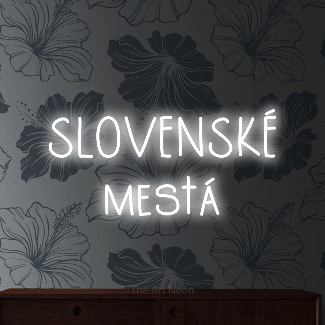 LED neon sign reading “SLOVENSKÉ mestá”, arranged in two lines.