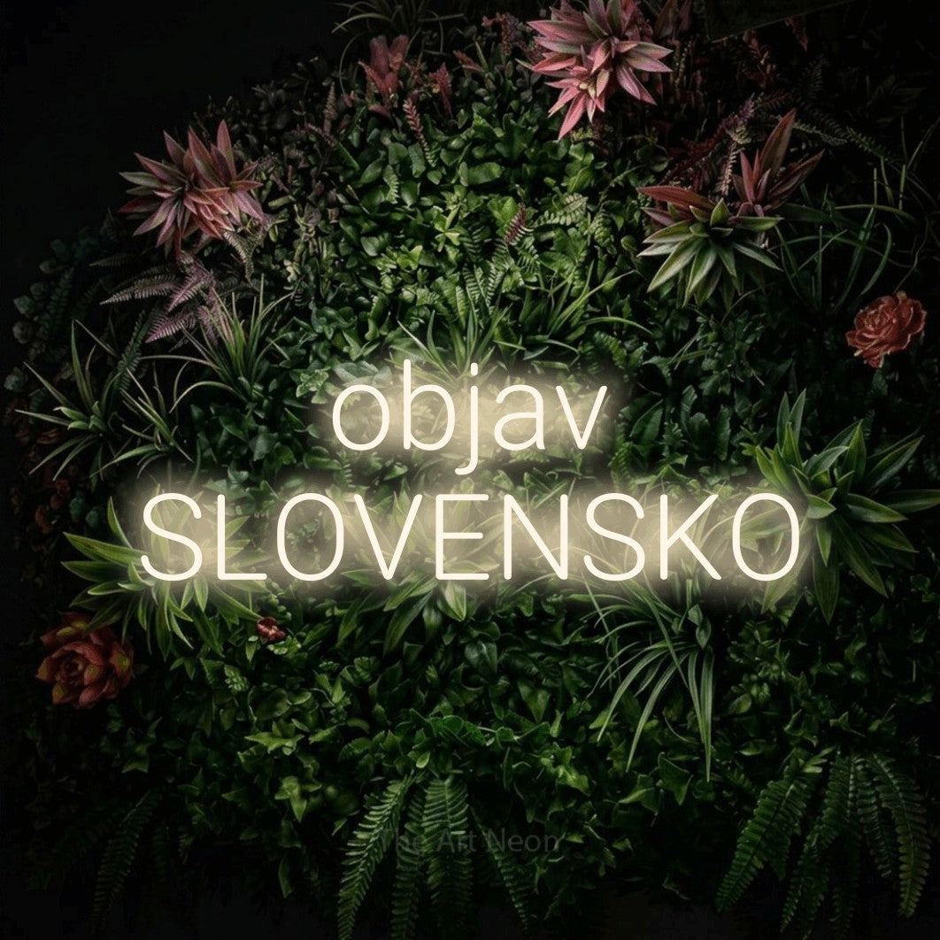 LED neon sign reading “objav SLOVENSKO”, arranged in two lines.